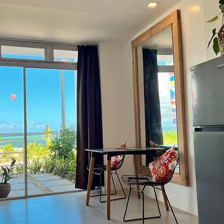 Beachfront Apartment With Kitchen And Outdoor Seating Area